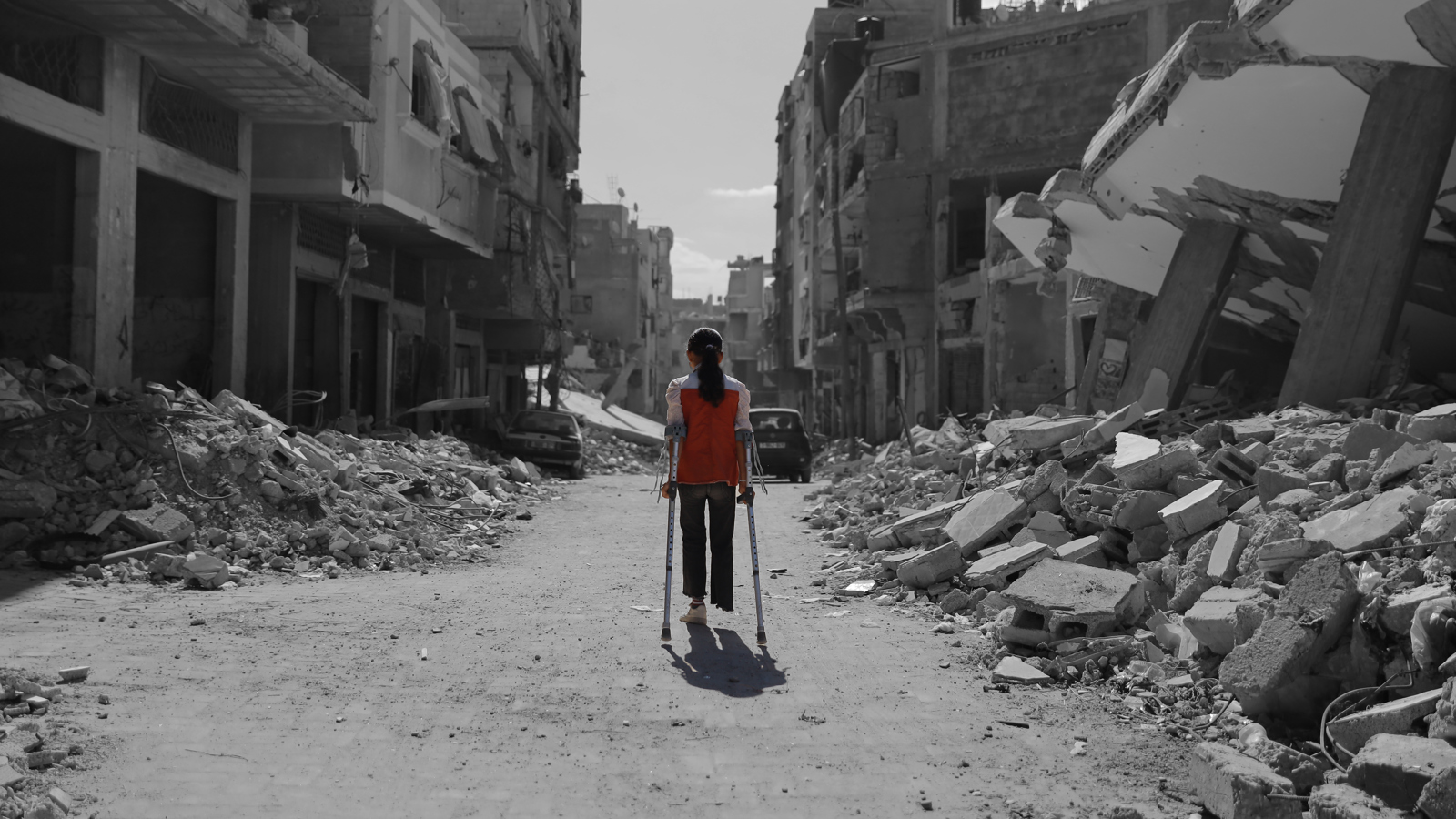 girl walk rubble